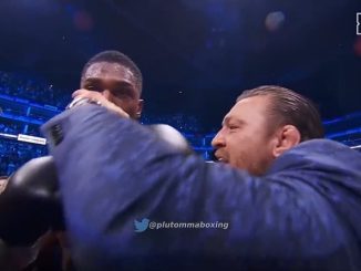 Anthony Joshua takes a swig of Conor McGregor’s pint of stout after securing knockout win over Robert Helenius