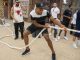 Anthony Joshua takes on a bizarre liger animal in tug-of-war during his trip to exotic zoo in Dubai… as British boxing star also strikes a pose alongside a baby lion and snakes